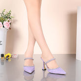 Lilafarbene Pumps aus Leder mit Pailletten und Kristallen